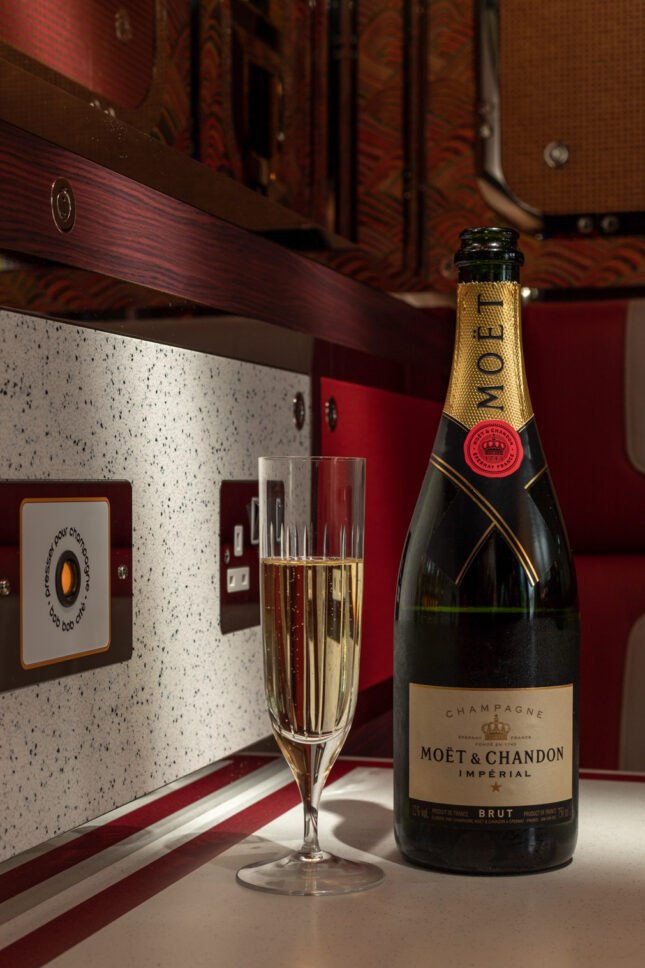 Moët & Chandon champagne beside Press for Champagne button — Bob Bob Ricard City, restaurant photographer London