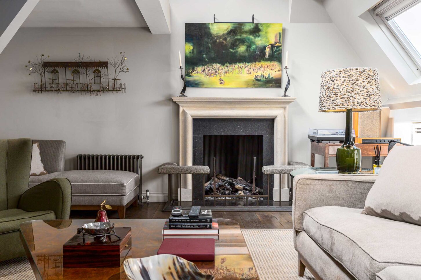 Living room with fireplace and colourful decor — Amies Street, London