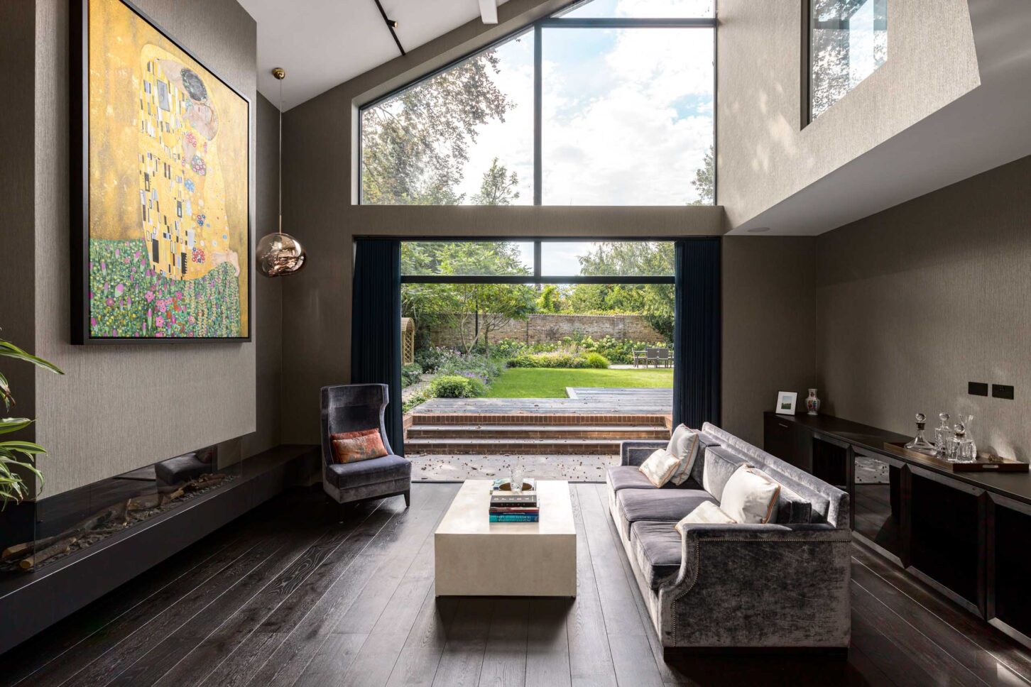 Bright living room interior with large windows — Petersham House, designed by Browning Architects, London