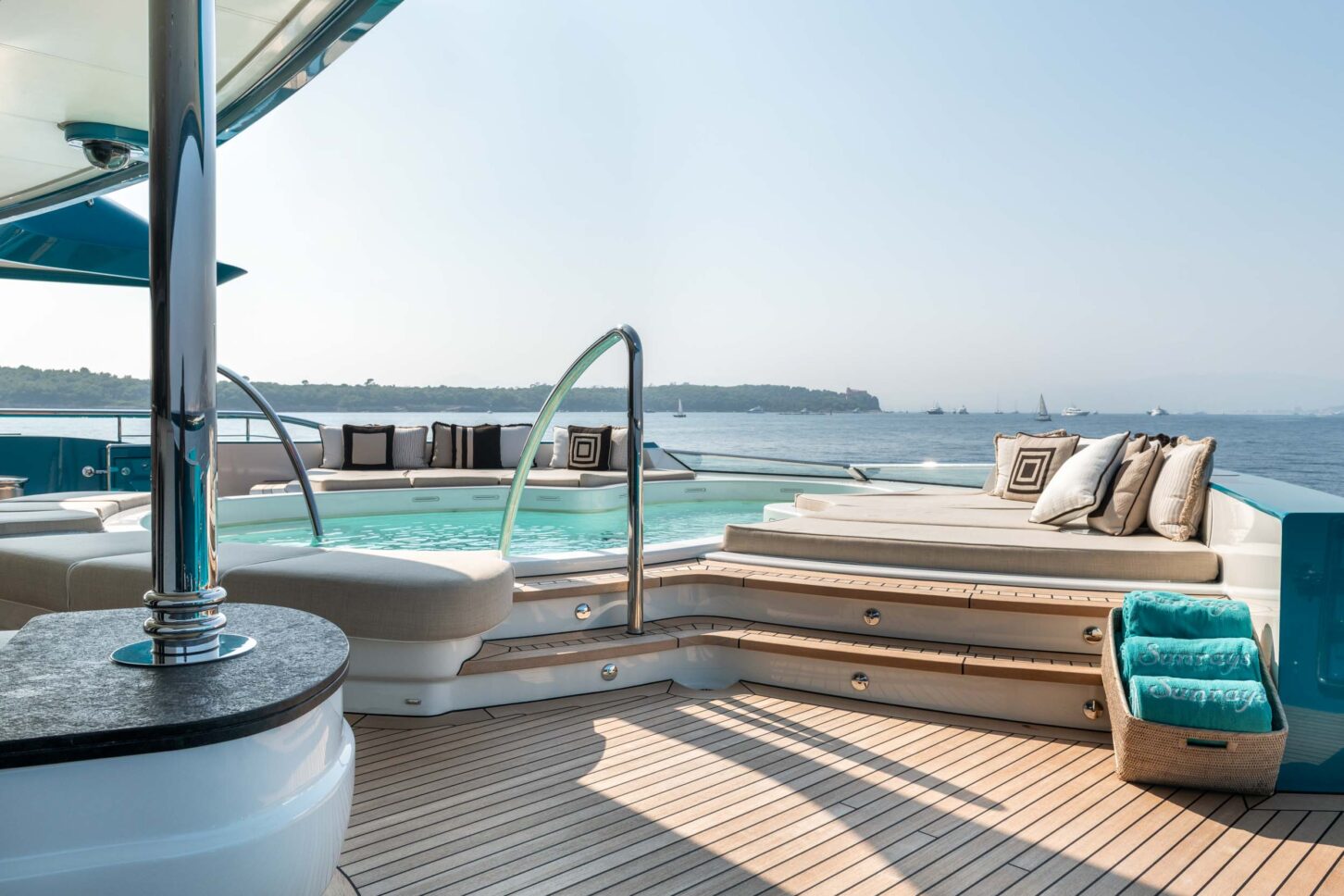Yacht deck with jacuzzi pool and outdoor seating