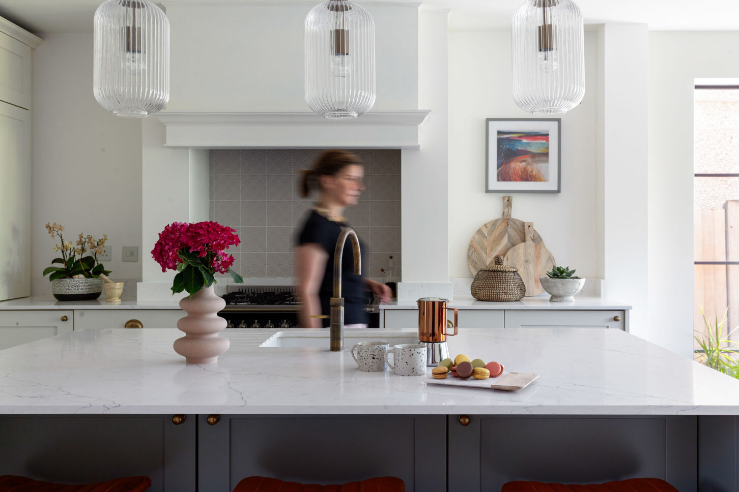 Kitchen island with marble countertop and pendant lighting — interior photographer London, Blue + Green Interiors