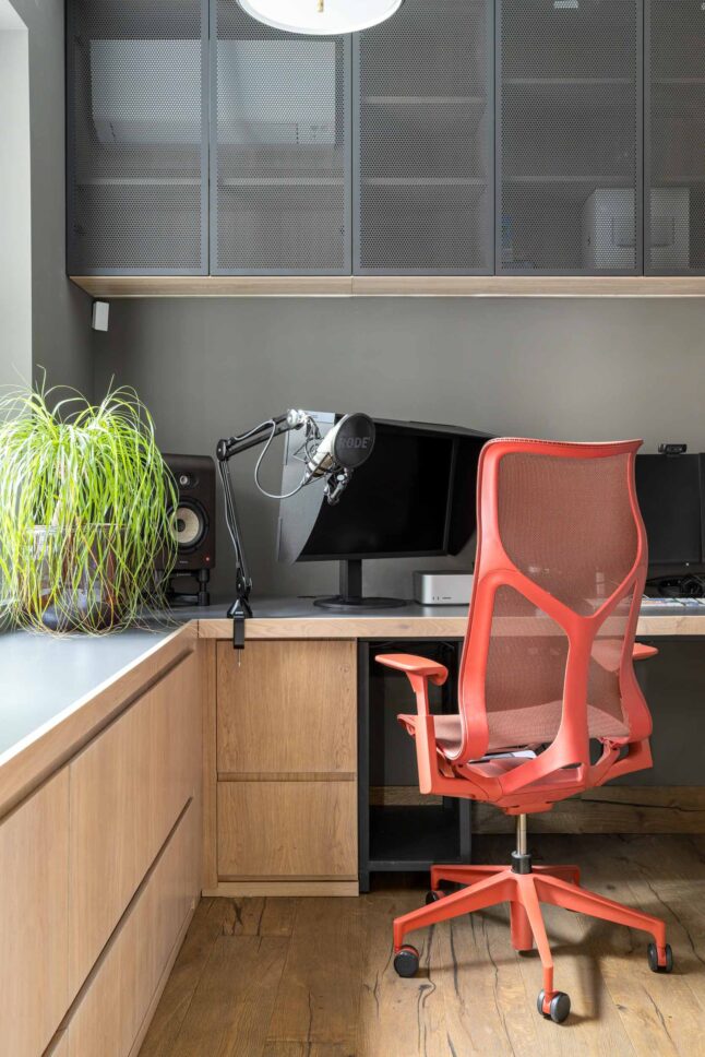 Office desk setup with podcast microphone and mesh cabinetry, designed by Unknown Makers — Kingsland project, London