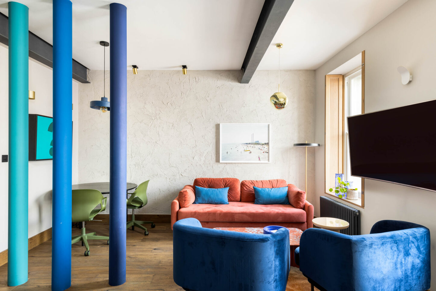 Office lounge seating area with velvet sofa and armchairs, designed by Unknown Makers — Kingsland project, London